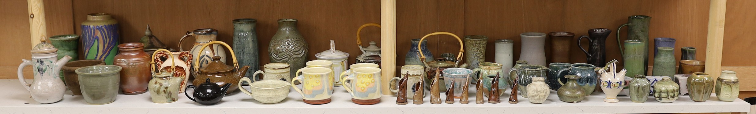 A large quantity of British studio pottery teapots, mugs, jugs and other miscellaneous items, to include a vast amount by Susan Threadgold